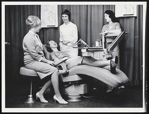 Hygienists demonstrate latest equipment. From left, Marietta Nigrell, Weymouth; Joan Mulhern, Arlington; Marilyn Lavallee, Chicopee Falls; and Carole Seablom, West Bridgewater.