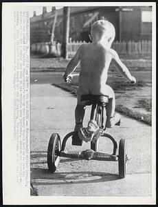 Heat?? - The Bare Facts -- Three-year-old William Stumm, Jr., had his own method for beating Philadelphia's better than ninety degree heat as he gave his uniform of the day a rumble seat ride on his tricycle here yesterday. Respite was short-lived, however. Young William's father caught him out of uniform. The weather man, by the way, predicted more high temperatures for today.