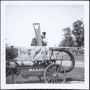 Harold B. Olsen with Warren hand tub after victory