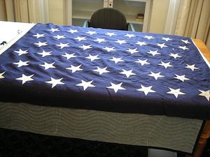 Banner with white stars on a blue ground