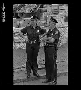 Male and female police officers on duty at Haymarket, Boston