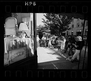 Design class observes store display, Newbury Street, downtown Boston