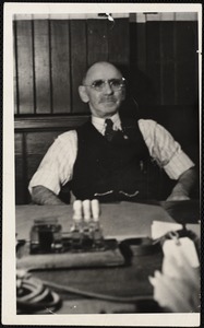 Charles Broadbent at his desk Arlington Mills wool room - clerk