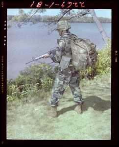 Combat arms div., rear view, woodland with Alice + Kevlar helmet