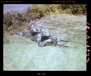 Combat arms div., prone position, woodland uniform, Kevlar helmet + vest and Alice