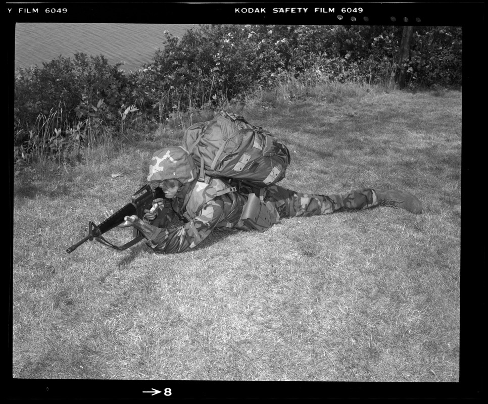 Combat arms div., prone position, woodland uniform, Kevlar helmet + vest and Alice