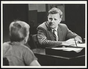 A Vital Interview - Philip Abbott, as probation officer John Collier, interviews a young first offender in the opening case on the NBC-TV Network's new daytime drama series, "The House on High Street." The program, which is based on actual cases from the files of Domestic Relations Courts, Mondays. It is Collier's job, on assignment by a judge, to seek out and question anyone who might be able to offer a clue to the defendent's behavior.