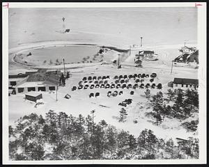 Snowbound Soldiers at Camp Edwards - Cars belonging to military personnel at Camp Edwards, Cape Cod, were snowbound yesterday in parking lot near gate where they were left after main roads from area were blocked in the Cape's worst snowstorm in a half-century.