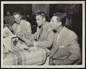 Indians, Old and New- Cleveland's veteran third baseman, Al Rosen, dines at the Hotel Kenmore with two new members of the club, Pitcher Art Houtteman (center) and Catcher Joe Ginsberg, who were obtained recently in a trade with he Detroit Tigers. The Indians open a series with the Red Sox with games this afternoon and tonight at Fenway Park.