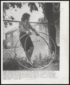 Just One More Day--Only the fence and a few hours separate the hula hoops and the classroom for Sandra Laird,10, as she and thousands of Dallas youngsters end their summer vacation Sept. 2. Tuesday will see them filling into the classrooms for a long 9-month stretch until it’s time again to while away the hours of freedom that are associated with students and school days.
