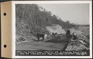 Contract No. 82, Constructing Quabbin Hill Road, Ware, placing asphalt near Sta. 28, looking back from Sta. 29, Ware, Mass., Oct. 24, 1939