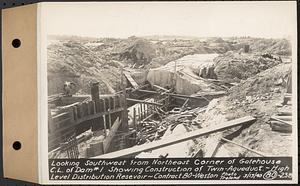 Contract No. 80, High Level Distribution Reservoir, Weston, looking southwest from northeast corner of gatehouse, center line of dam 1, showing construction of twin aqueduct, high level distribution reservoir, Weston, Mass., Mar. 13, 1940