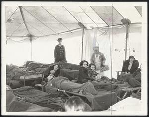 Caring For Quake Injured -- An Emergency Hospital, Set Up in Lincoln Park, Long Beach, Calif., With Many Victims of the Earthquake March 10. All Doctors and Nurses in the City Were Mobilized to Give Immediate Aid to the Injured. Many Hundreds Were Injured in Long Beach Alone, and More Than 60 Were Killed.