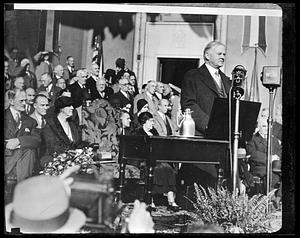 Herbert Hoover standing in front of a crowd