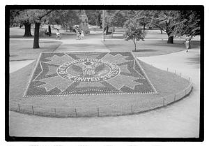 Veterans of Foreign Wars of the United States logo floral design in front of Ether Monument, Public Garden