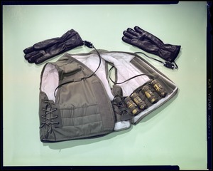 Battery carrying vest with handwear, auxillary, heated