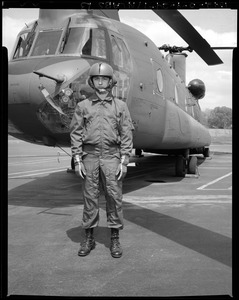 CEMEL, clothing, protective, fire retardant, air crewman's uniform, cold weather w/helmet (G.I. in front of chopper)