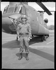 CEMEL, clothing, protective, fire retardant, air crewman's uniform, cold weather w/helmet (G.I. in front of chopper)
