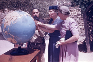Helen Keller and Polly Thomson Exploring Tactile Globe
