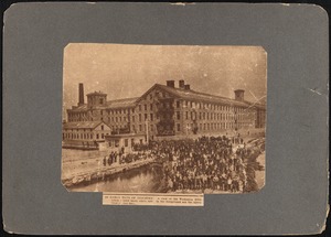 Wamsutta Mills with mill workers standing outside in foreground, New Bedford, MA