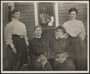Photograph of four unidentified women, with unidentified man in doorway