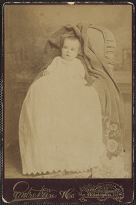 Unidentified infant in long white gown