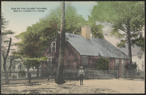 One of the oldest houses, South Yarmouth, Mass., with child standing in front
