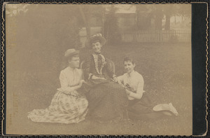 Three unidentified women seated in yard