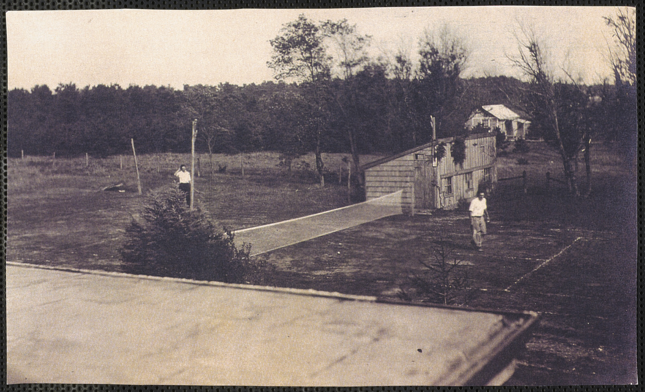 Playing tennis, Thomas Crowell (left), William Crowell (right)