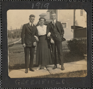 Two unidentified men and unidentified woman