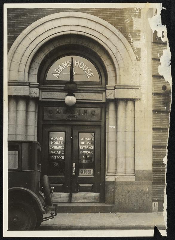 The cafe entrance of the Adams House on Mason street. Note the sign “closed” in the door.