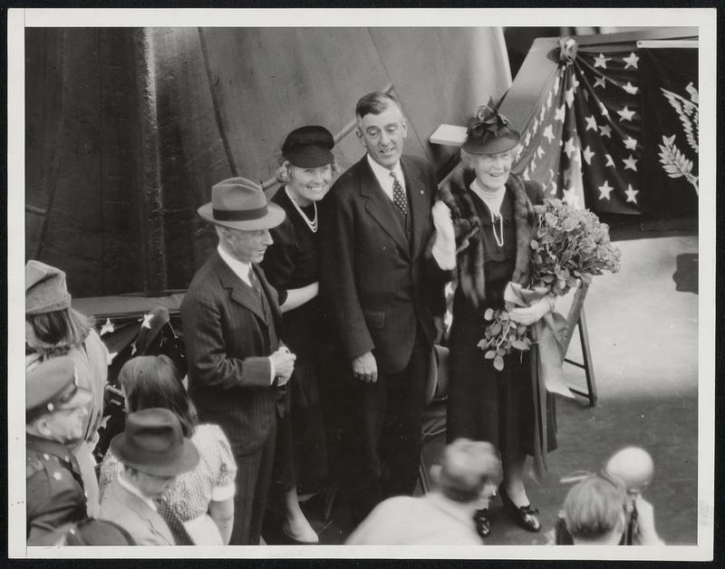 Notables at Battleship Launching. Quincy Mass: Left to Right, Mr. Charles Francis Adams, Former Secretary of Navy., Mrs. Leverett Saltonstall, Wife of Massachsetts Governor., Governor Leverett Saltonstall of Massachsetts, and Mrs Charles Francis Adams Who Acted as Sponsor for the Battleship Massachsetts Launched Today at the Fore River Shipyard.