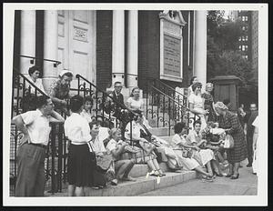 Stranded By MTA Strike - Left without transportation, MTA patrons sat on the steps of the Park Street Church yesterday as they tried to decide whether they would walk home, await a taxicab or telephone relatives and friends to pick them up.