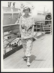 Returns From English Tennis Matches. Miss Elizabeth Ryan, well known American tennis player, as she arrived in New York, July 23, on the Liner Europa, returning from the recent tennis matches in England.