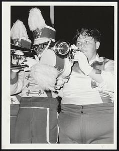 Lee Carlson blows his horn at CYO National competition at Boston College.