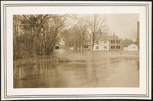 Flooding on Groton Street, with covered bridge