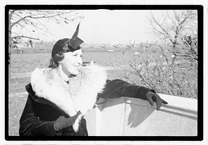 A model posing by the Oliver Wendall Holmes Memorial Sundial