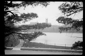 Gasson Hall in background, body of water and street in foreground