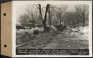 Contract No. 71, WPA Sewer Construction, Holden, Main Street, looking ahead from near manhole 6B4-31, showing backfill on line of sidewalk, Holden Sewer, Holden, Mass., Jan. 9, 1941