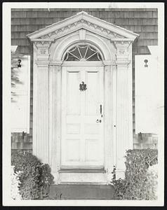 Magic Casement--A fine example of an early New England doorway with the popular eagle door-knocker of Federalist days. The door shown in the photograph is that of the Green homestead in Newport, R.I.