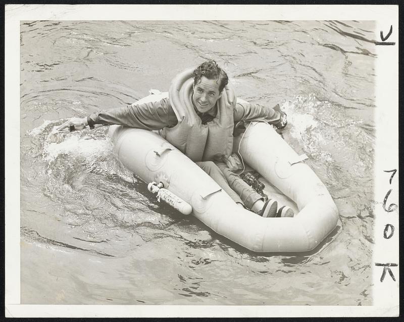 A New One-Man Parachute Boat Ralph Douglas gives a practical demonstration of the new one-man parachute boat for fliers of single-seaten fighter planes. In case the boat should be pierced with machine gun fire, the equipment includes special plugs the flier can quickly fasten into the holes made by a bullet. If any accident should happen to the boat he has equipment for emergency use which he can use either working from within the boat or from in the water. In addition, he has a collapsible fabric bailing cup and a collapsible fabric sea anchor. The Government also furnishes a can of water and a sea marker for use by the flier in drawing attention for rescue purposes.