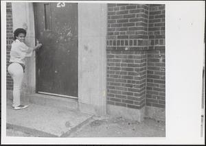 Nodi and her front door at Newtowne Court