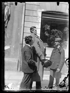 Three unidentified men