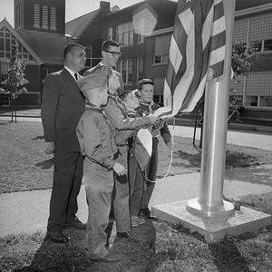 Flag raising ceremony at Center School, 17 Barstow Street, Mattapoisett, MA