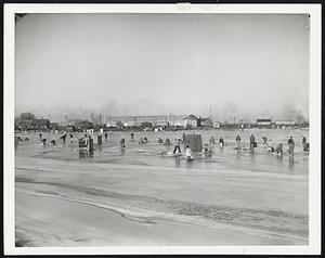 A Day With the Ice Fisherman. A general view of ice fishing on Sandusky Bay.