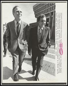 Boston Mayor Kevin White (L) and Sen. Edmund Muskie (R) Dem.-Maine, stroll on Boston's City Hall Plaza (City Hall bckgrd.) during a Voter Registration Rally in the plaza (10/8). Sen. Muskie in a brief speech urged young people to register to vote.