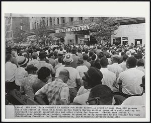 New York – Rally In Harlem For Negro Rights – A crowd of more than 500 persons fills the street in front of a hotel in New York’s Harlem section today at a rally calling for increased employment opportunities and other rights for Negroes. Co-Chairman Arnold P. Johnson, near loudspeakers, center, speaks to crowd at rally sponsored by the Greater New York Coordinating Committee for Equal Opportunity.