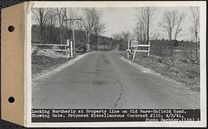 Contract No. 118, Miscellaneous Construction at Winsor Dam and Quabbin Dike, Belchertown, Ware, looking northerly at property line on Old Ware-Enfield Road, showing gate, Ware, Mass., Apr. 3, 1941