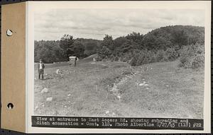 Contract No. 118, Miscellaneous Construction at Winsor Dam and Quabbin Dike, Belchertown, Ware, view at entrance to east access road showing subgrading and ditch excavation, Ware, Mass., Aug. 27, 1945