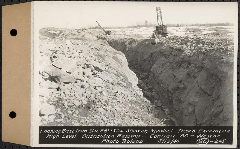 Contract No. 80, High Level Distribution Reservoir, Weston, looking east from Sta. 881+50+/-, showing aqueduct trench excavation, high level distribution reservoir, Weston, Mass., Mar. 13, 1940